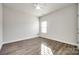 Well lit bedroom with wood flooring at 859 Accent Se Ave, Concord, NC 28025