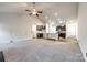 Open concept kitchen with island and dark cabinetry at 859 Accent Se Ave, Concord, NC 28025