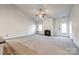 Bright living room with a fireplace and vaulted ceiling at 859 Accent Se Ave, Concord, NC 28025