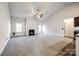 Spacious living room featuring a fireplace and high ceilings at 859 Accent Se Ave, Concord, NC 28025