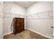 Large walk-in closet with ample shelving at 859 Accent Se Ave, Concord, NC 28025