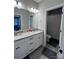 Clean bathroom with double vanity and shower/tub combo at 8928 Morning Mist Rd, Charlotte, NC 28215