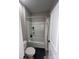 Simple bathroom with shower/tub and neutral colors at 8928 Morning Mist Rd, Charlotte, NC 28215