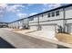 Row of attached garages with individual driveways at 8928 Morning Mist Rd, Charlotte, NC 28215