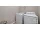 Convenient laundry room with washer and dryer at 8928 Morning Mist Rd, Charlotte, NC 28215