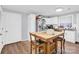 Kitchen with white cabinets, wood table and stainless steel appliances at 911 Elm St, Kannapolis, NC 28081