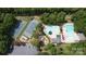 Aerial view of community amenities including tennis courts, playground, and a sparkling pool at 1000 Weeping Willow Ln, Matthews, NC 28105