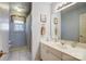 Bathroom featuring a vanity, mirror, shower with curtain, and tile flooring at 1000 Weeping Willow Ln, Matthews, NC 28105