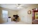 Office with a large window, providing a view of the outdoors, ceiling fan, and carpet at 1000 Weeping Willow Ln, Matthews, NC 28105