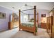 Bedroom with vaulted ceiling, natural light, and classic furnishings at 1000 Weeping Willow Ln, Matthews, NC 28105