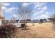 Large backyard with a view of other homes at 10318 Threatt Woods Dr, Charlotte, NC 28277