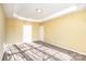 Spacious bedroom with neutral walls and carpet flooring at 10318 Threatt Woods Dr, Charlotte, NC 28277