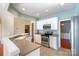 Kitchen with stainless steel appliances and white cabinets at 10318 Threatt Woods Dr, Charlotte, NC 28277