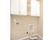 Laundry room with white cabinets and hookups at 10318 Threatt Woods Dr, Charlotte, NC 28277