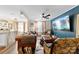 Spacious living room with large TV and comfy seating at 11532 Delores Ferguson Ln # 1004, Charlotte, NC 28277