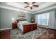 Bright bedroom with wood flooring and large window at 11925 Lawings Corner Dr, Huntersville, NC 28078