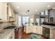 Gourmet kitchen with granite countertops and stainless steel appliances at 11925 Lawings Corner Dr, Huntersville, NC 28078