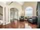 Sitting room with hardwood floors, two armchairs, and a large window at 11925 Lawings Corner Dr, Huntersville, NC 28078