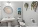 Small bathroom with pedestal sink and toilet at 12 Tanglewood Rd, Clover, SC 29710