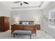 Main bedroom with wood sleigh bed and large windows at 12 Tanglewood Rd, Clover, SC 29710