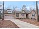 Brick house with attached garage and landscaping at 12 Tanglewood Rd, Clover, SC 29710