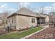 Brick house exterior with a screened porch and landscaped yard at 12 Tanglewood Rd, Clover, SC 29710