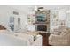 Living Room with stone fireplace and built-in shelving, hardwood floors at 12 Tanglewood Rd, Clover, SC 29710