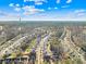 Aerial view of a residential neighborhood with houses and trees at 13026 Serenity St, Huntersville, NC 28078