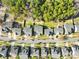 Aerial view of neighborhood showing homes and street at 13026 Serenity St, Huntersville, NC 28078