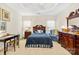 Charming bedroom with dresser and sitting area at 13026 Serenity St, Huntersville, NC 28078