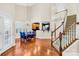 Spacious dining area with hardwood floors and kitchen views at 13026 Serenity St, Huntersville, NC 28078