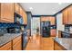 Well-equipped kitchen featuring granite countertops and ample cabinetry at 13026 Serenity St, Huntersville, NC 28078