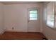 Simple dining area with hardwood floors and exterior access at 1418 Winston Dr, Charlotte, NC 28205