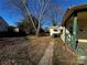 House exterior with green porch and walkway at 1418 Winston Dr, Charlotte, NC 28205