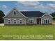 Sample photo of a gray one-story house with a green lawn at 142 Falls Leaf Dr, Troutman, NC 28166