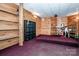 Finished basement room with wood walls and a stage area at 148 Shawver Ln, Statesville, NC 28625