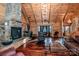 Vast living area with a large stone fireplace and high ceilings at 148 Shawver Ln, Statesville, NC 28625