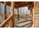 Wooden porch with views of the backyard and surrounding woods at 148 Shawver Ln, Statesville, NC 28625