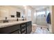 Elegant bathroom with granite countertops and a large shower at 1585 Whitman Ct, York, SC 29745