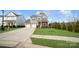 Two-story house with gray siding, stone accents, and a two-car garage at 1585 Whitman Ct, York, SC 29745