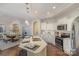 Open concept kitchen island, granite countertops, and stainless steel appliances at 1608 Traditions Ct, Waxhaw, NC 28173