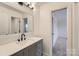 Modern bathroom with gray vanity and quartz countertop at 18038 Greyfield Gln, Fort Mill, SC 29707