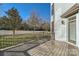 Back deck with wood flooring and backyard view at 18038 Greyfield Gln, Fort Mill, SC 29707