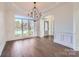 Formal dining room with hardwood floors, wainscoting, and chandelier at 18038 Greyfield Gln, Fort Mill, SC 29707