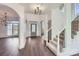 Bright and spacious entryway with hardwood floors and elegant staircase at 18038 Greyfield Gln, Fort Mill, SC 29707