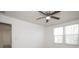 Bedroom with ceiling fan and large windows at 1812 Hooper Ct, Charlotte, NC 28212