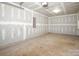 Unfinished garage with ample space for storage at 1812 Hooper Ct, Charlotte, NC 28212