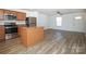 Kitchen with island, stainless steel appliances, and wood cabinets at 1812 Hooper Ct, Charlotte, NC 28212