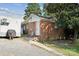 Brick exterior of building with small ramp leading to entry door, perfect for storage or workshop at 1901 Ashcraft Ave, Monroe, NC 28110