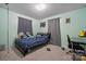 Bedroom featuring plush carpet and a calming ambiance at 1901 Ashcraft Ave, Monroe, NC 28110